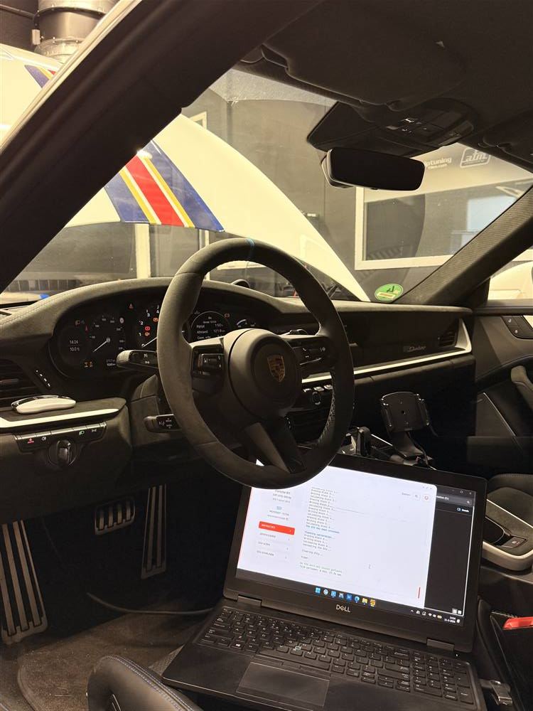 Porsche 911 interior during a tuning session